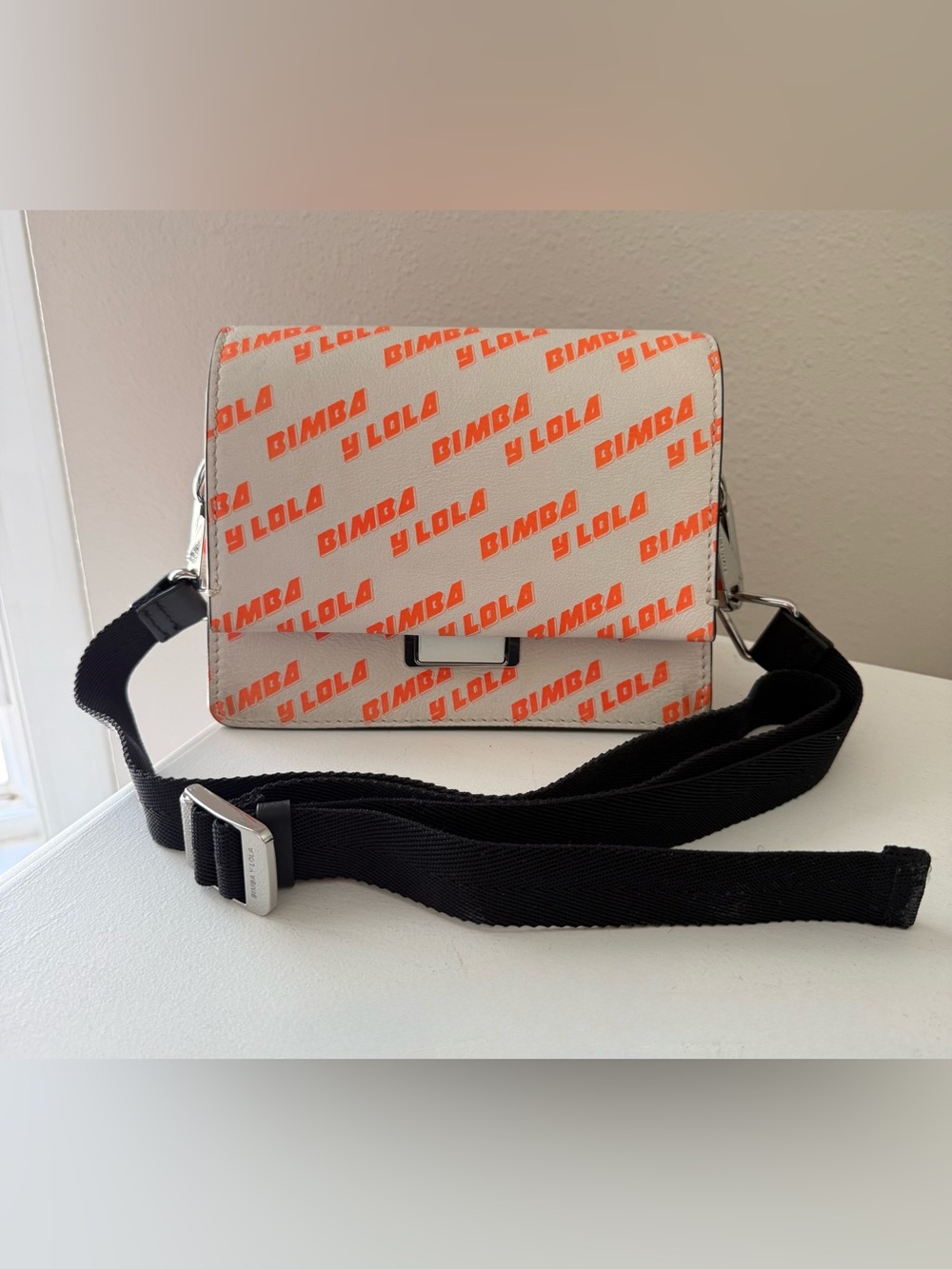 Bimba Y Lola | Cream Orange Signature  Leather Crossbody Bag | Black Nylon Strap